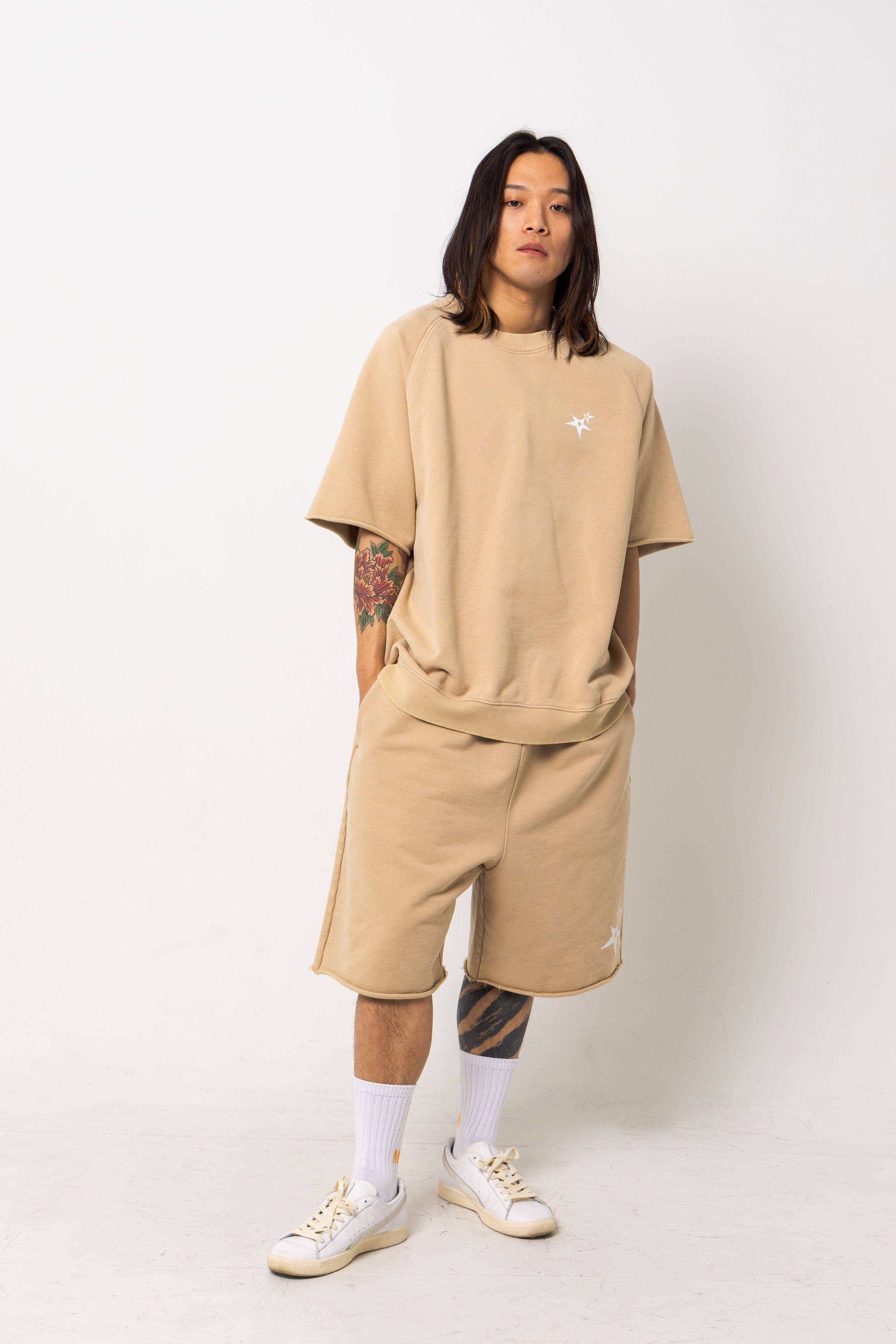 Powder processed sweat half pants