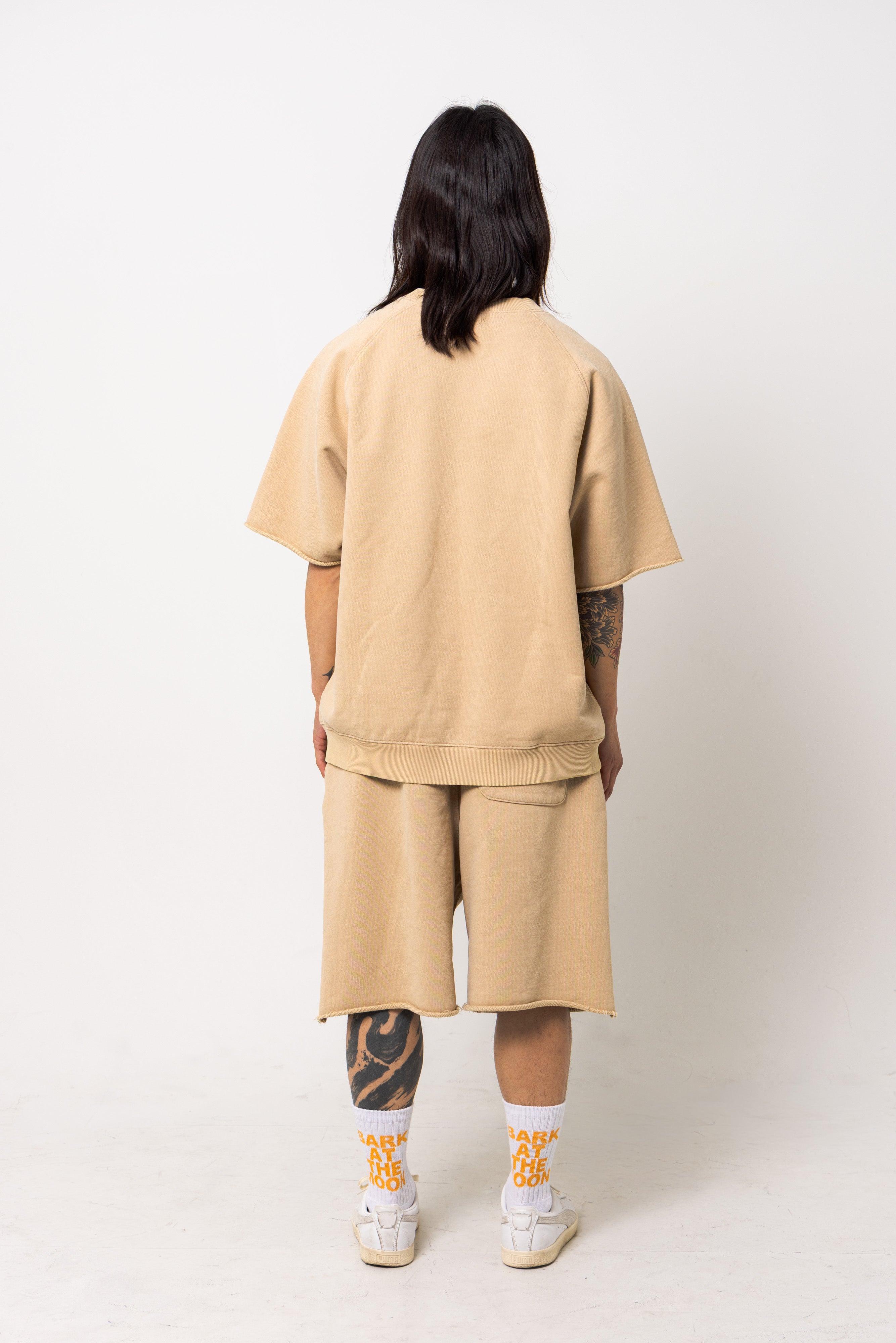 Powder processed sweat half pants