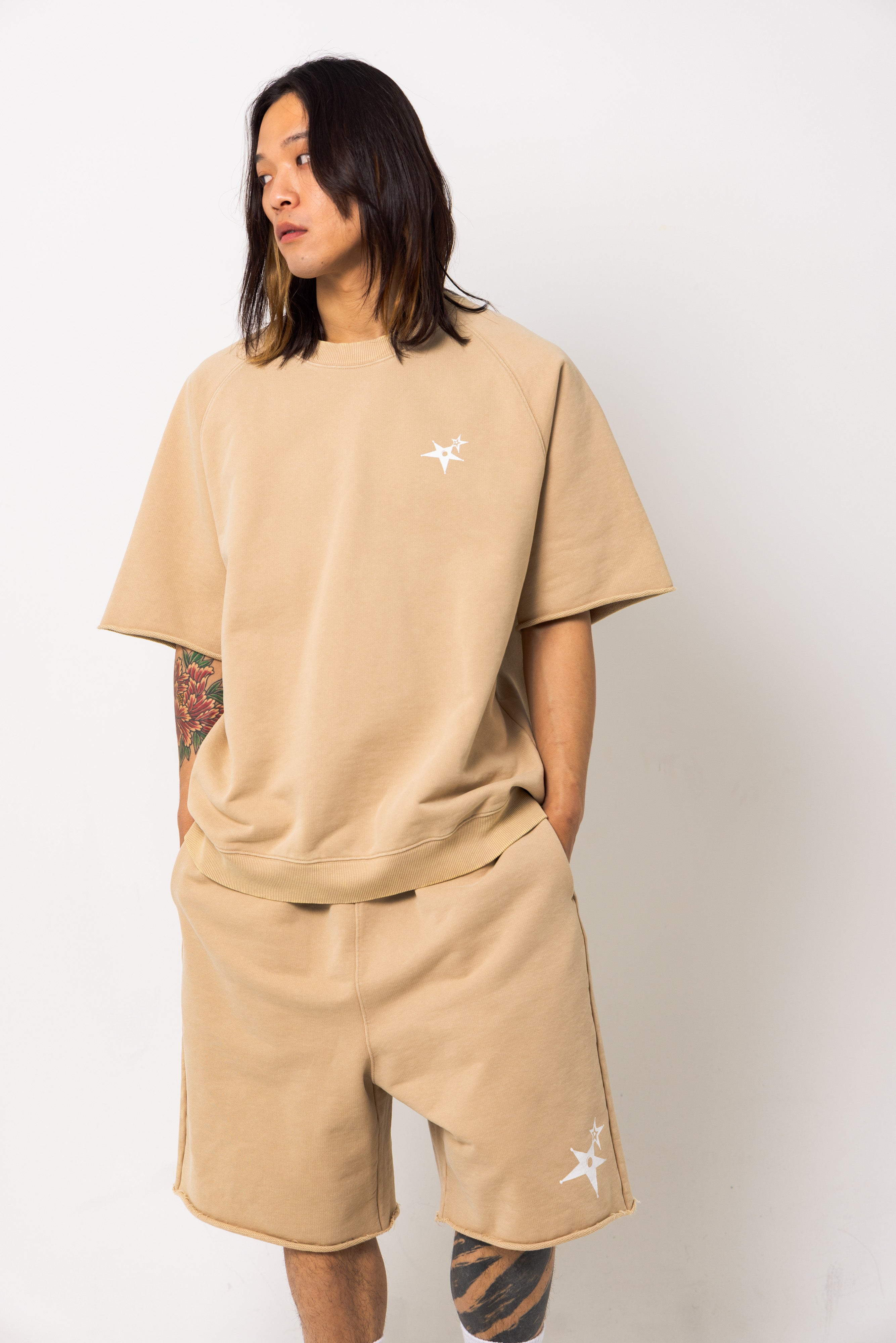 Powder processed sweat half pants