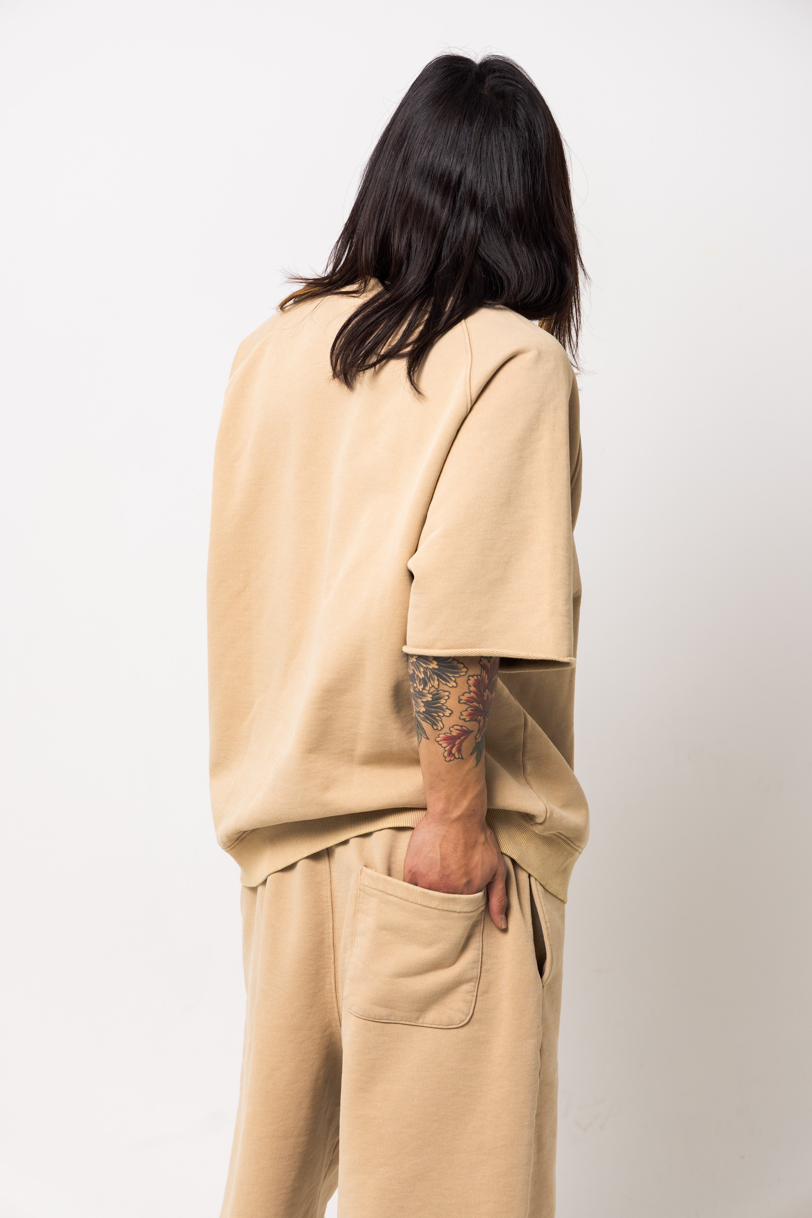 Powder processed sweat half pants