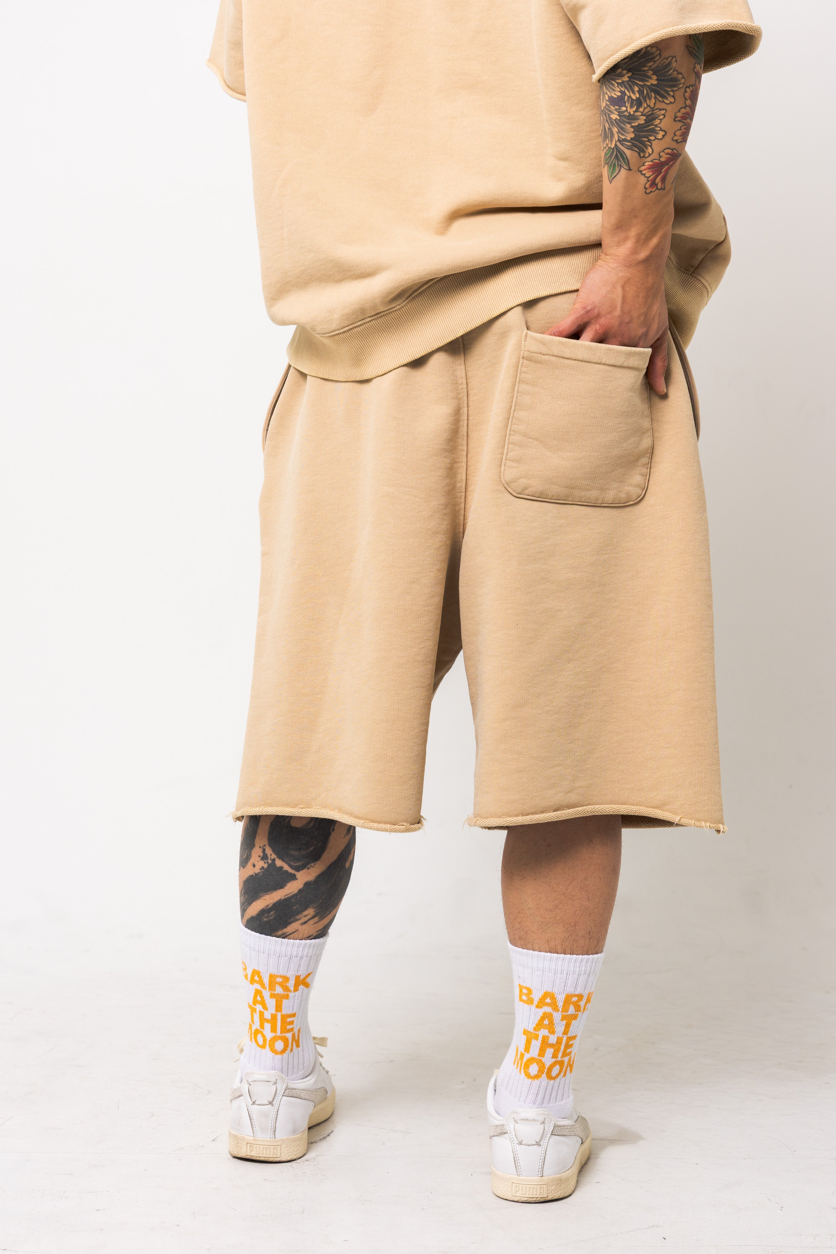 Powder processed sweat half pants